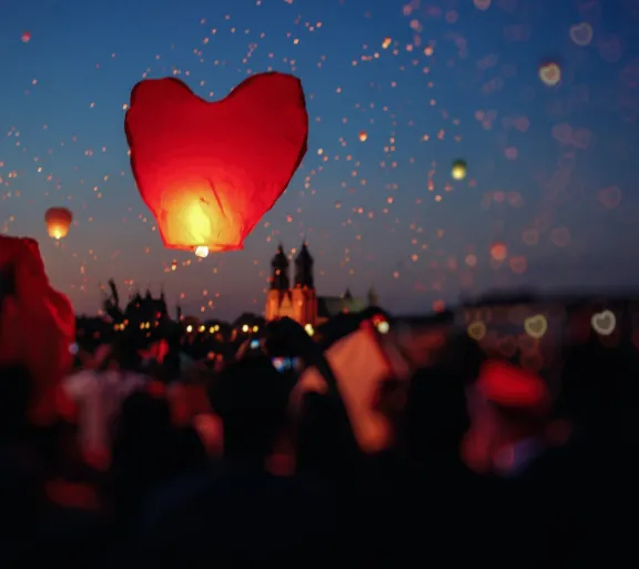 heart balloons in night sky