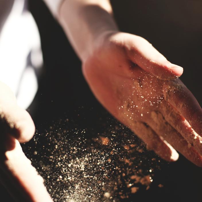 hands with flour