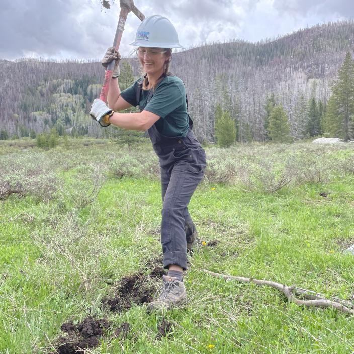 woman digging a trench