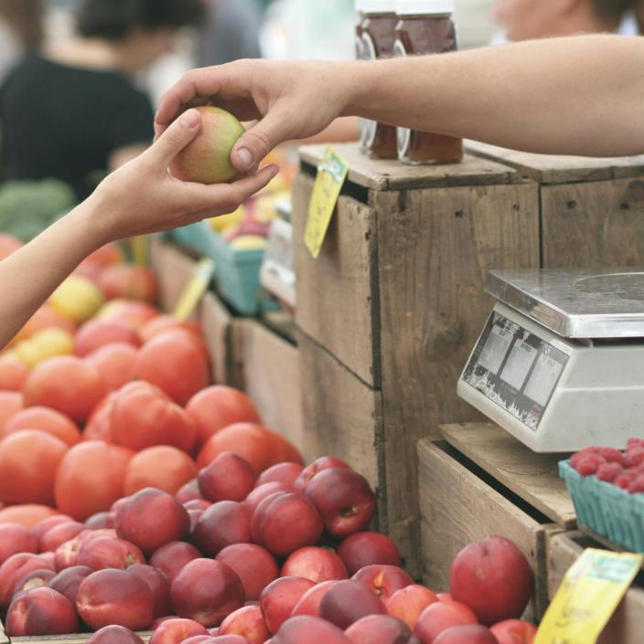 person buying produce