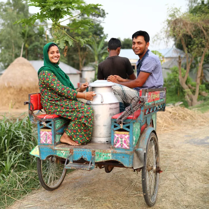 people riding in a cart