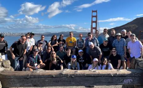 group of people in front of golden gate bridge