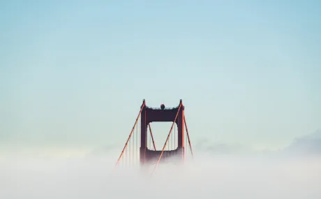 top of golden gate bridge in fog