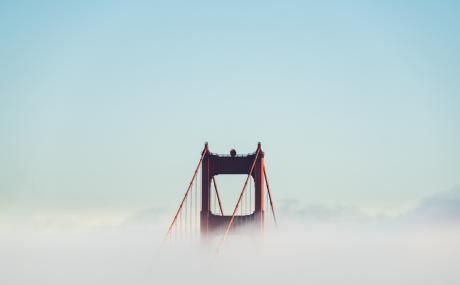 top of golden gate bridge in fog