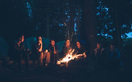 people around a campfire