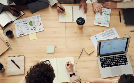 overhead view of people working at a table